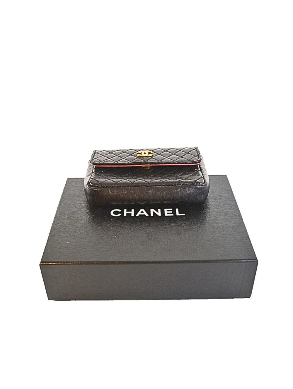 Chanel A Black Quilted Lambskin Leather Micro Flap Bag With Gold Hardware